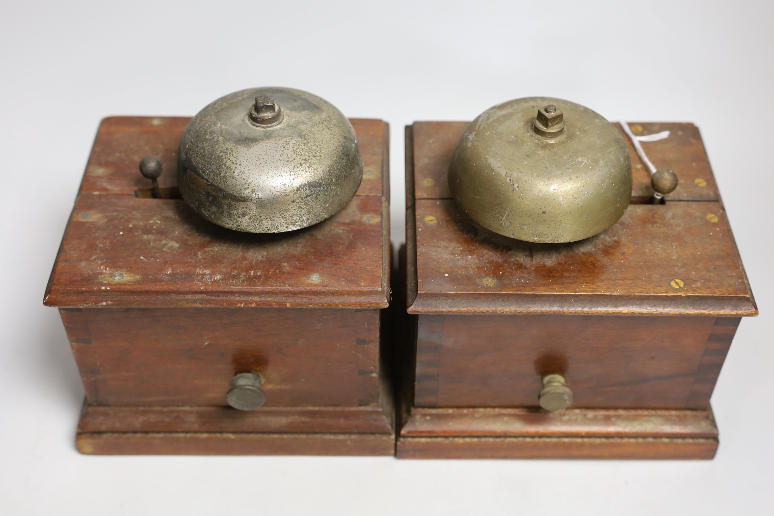 Two W.R.Sykes mahogany small signal box bells, one bears manufacturer's plaque